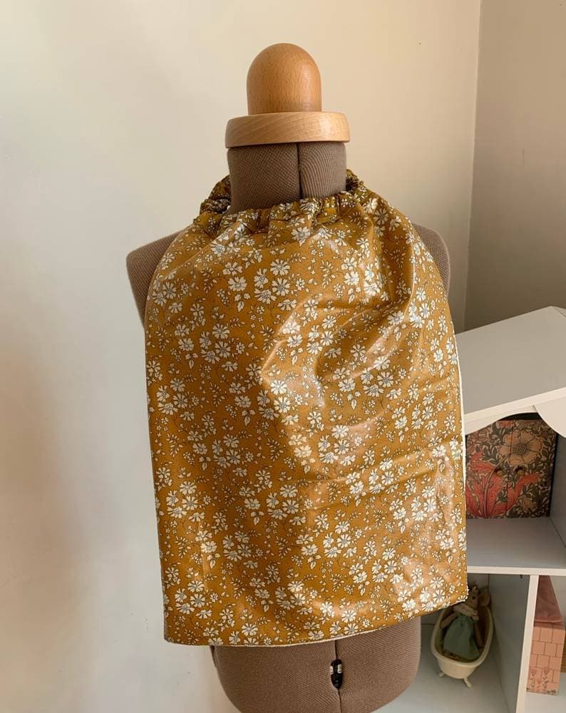 Bavoir géant enduit à enfiler Capel Moutarde